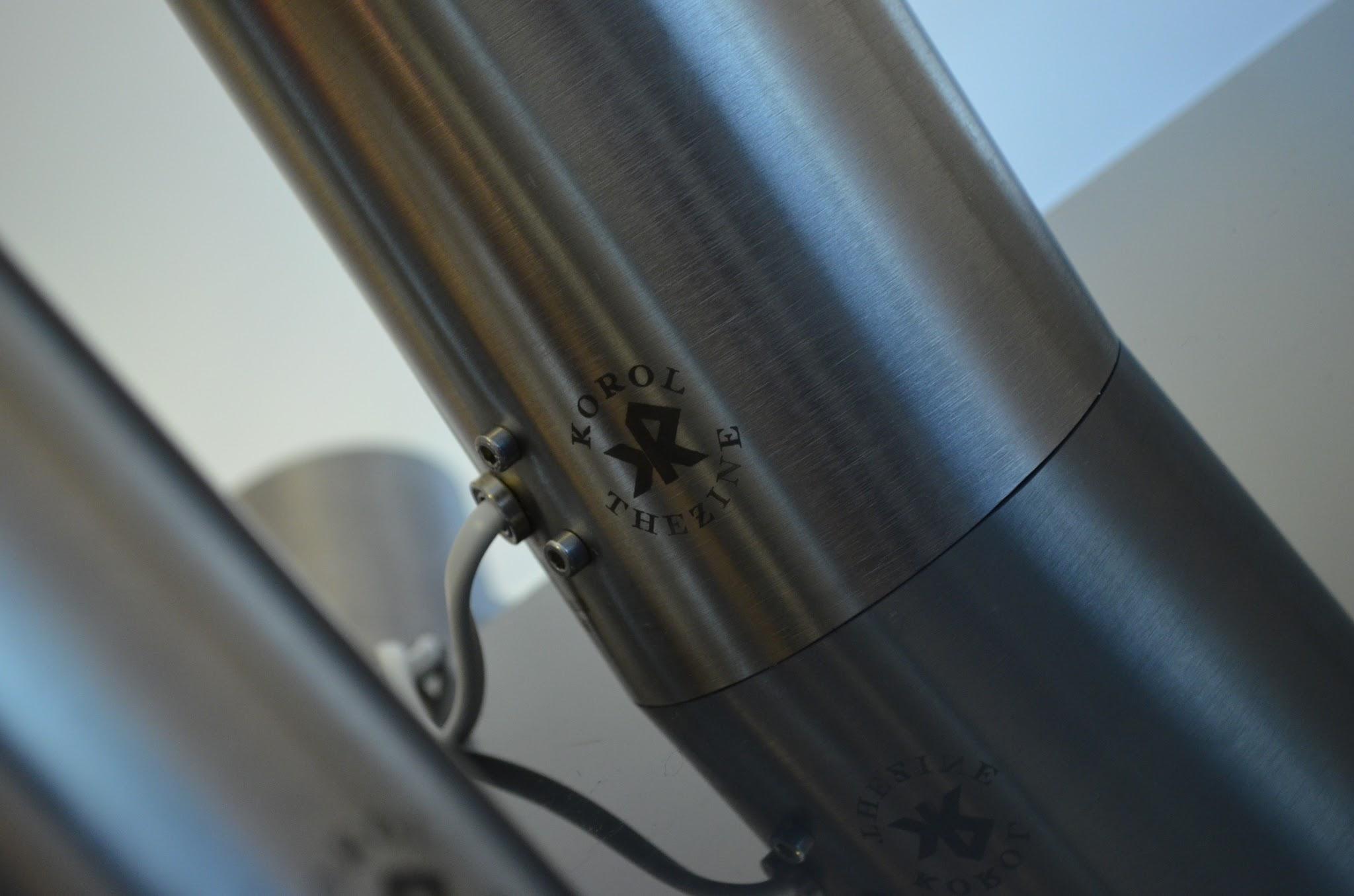 Brushed stainless steel luminaire lighting a quiet interior