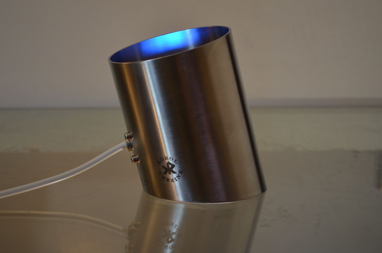Luminaire tilted with blue light inside